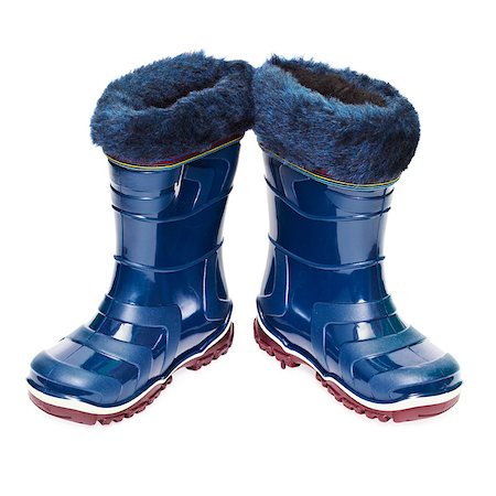 simsearch:400-05701597,k - A pair of small rubber boots with artificial fur isolated on white background Foto de stock - Royalty-Free Super Valor e Assinatura, Número: 400-05343857