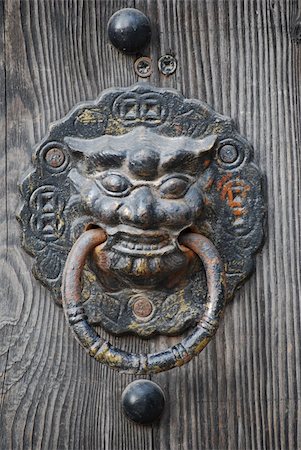 door lion - Bronze lion’s head handles -  Shanghai - Republic of China Stock Photo - Budget Royalty-Free & Subscription, Code: 400-05354091
