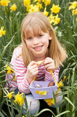 field of daffodil pictures - Young Girl In Daffodils At Easter Stock Photo - Budget Royalty-Free & Subscription, Code: 400-05354705