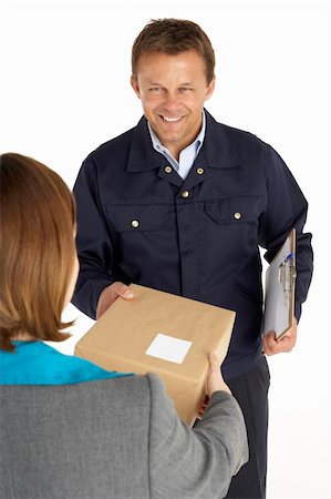 Courier Handing Over A Parcel To An Office Worker Stock Photo - Budget Royalty-Free & Subscription, Code: 400-05354742