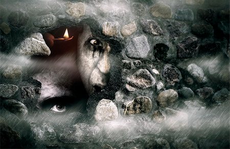 Halloween concept  of a broken stone wall with zombies Stock Photo - Budget Royalty-Free & Subscription, Code: 400-05355274