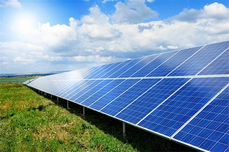 simsearch:400-06853280,k - Solar panel produces green, enviromentaly friendly energy from the sun. Stock Photo - Budget Royalty-Free & Subscription, Code: 400-05355295