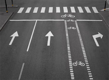 street with lanes, arrows and a cycling path Stock Photo - Budget Royalty-Free & Subscription, Code: 400-05355509