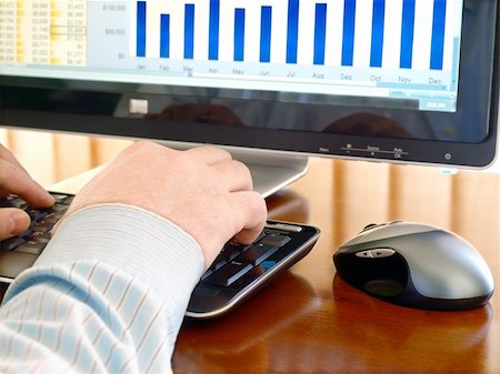 study online at home - Male hands on the keyboard in front of computer screen with charts Stock Photo - Budget Royalty-Free & Subscription, Code: 400-05355570