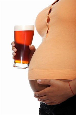 simsearch:600-01374351,k - Pregnant woman holding glass of alcohol ( beer ), isolated on white Photographie de stock - Aubaine LD & Abonnement, Code: 400-05356506