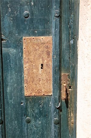 detail of wood door at Girona in Catalonia Spain Foto de stock - Super Valor sin royalties y Suscripción, Código: 400-05356638