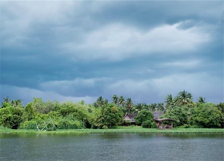 river house during monsoon rainy season in thailand Stock Photo - Budget Royalty-Free & Subscription, Code: 400-05356697