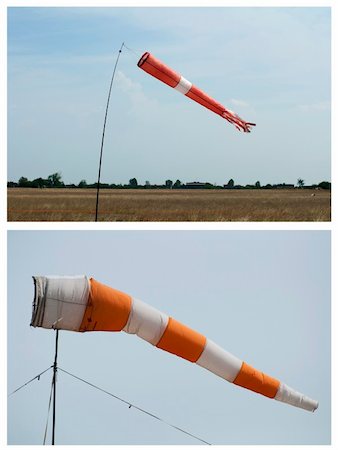 Red vane on blue sky background. Two items Photographie de stock - Aubaine LD & Abonnement, Code: 400-05356721