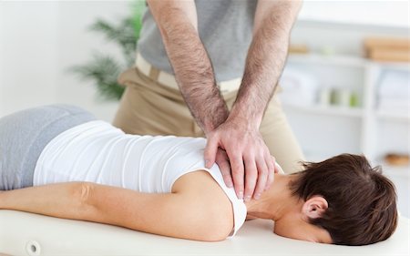 Man massaging a woman in a room Stockbilder - Microstock & Abonnement, Bildnummer: 400-05357082