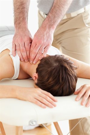 Woman getting a neck-massage in a room Stockbilder - Microstock & Abonnement, Bildnummer: 400-05357113