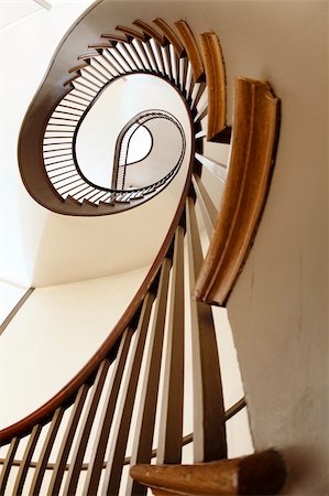 View looking up a wooden spiral staircase Stock Photo - Budget Royalty-Free & Subscription, Code: 400-05357157