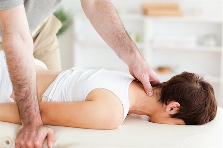 physical therapy shoulder - A young woman is having a massage Stock Photo - Budget Royalty-Free & Subscription, Code: 400-05357416