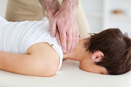 A masseur is massaging a customer's neck Stockbilder - Microstock & Abonnement, Bildnummer: 400-05357436