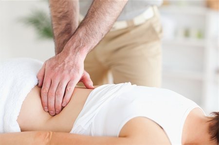 physical therapy shoulder - A masseur is massaging a woman Stock Photo - Budget Royalty-Free & Subscription, Code: 400-05357481
