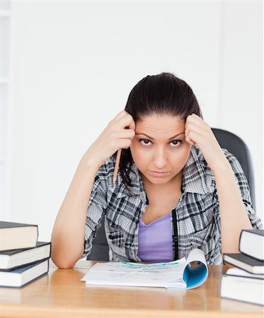 simsearch:400-04175049,k - A stressed student is looking into the camera Stock Photo - Budget Royalty-Free & Subscription, Code: 400-05357566