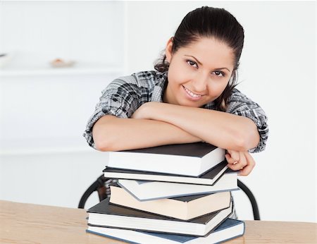 simsearch:400-04175049,k - A young student is leaning on books Stock Photo - Budget Royalty-Free & Subscription, Code: 400-05357580