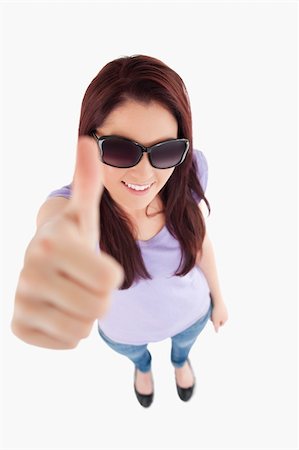 simsearch:400-06769983,k - Charming Woman with sunglasses in a studio Foto de stock - Royalty-Free Super Valor e Assinatura, Número: 400-05357890