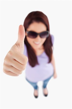 simsearch:400-06769983,k - Smiling Woman with sunglasses in a studio Foto de stock - Royalty-Free Super Valor e Assinatura, Número: 400-05357892