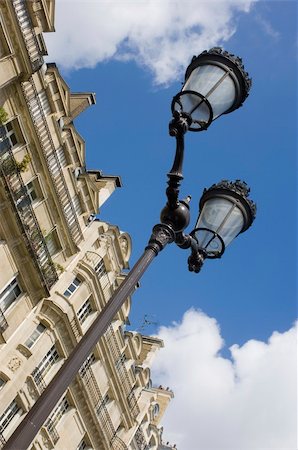 A typical Parisian street light in a residential area on Ile de la Cite Stock Photo - Budget Royalty-Free & Subscription, Code: 400-05358149