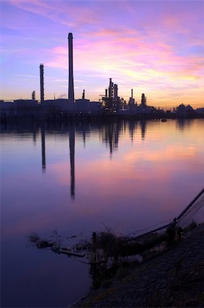 An oil refinery, situated in a commercial harbor, during a radiant sunset. HDR  image Stock Photo - Budget Royalty-Free & Subscription, Code: 400-05358160