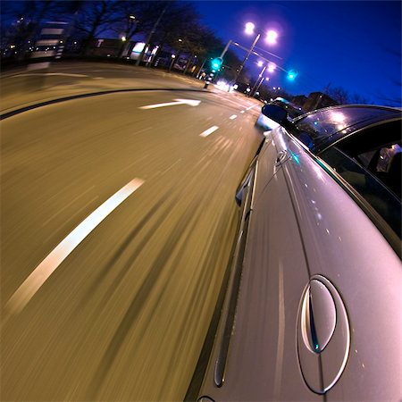 surpassing - A car hitting the breaks as the vehicle in front refuses to speed up after the traffic light turned green Stock Photo - Budget Royalty-Free & Subscription, Code: 400-05358184