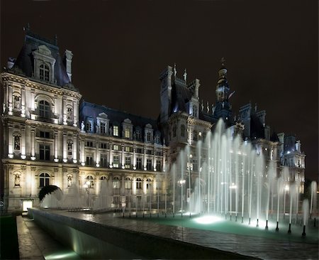 simsearch:400-05358650,k - The lit fountains in front of the Hotel de Ville in Paris at night, nicely illuminated to show the "grandeur" of the city Stock Photo - Budget Royalty-Free & Subscription, Code: 400-05358669