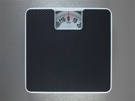 slate floor - Bathroom scales isolated against a metallic background Stock Photo - Budget Royalty-Free & Subscription, Code: 400-05358660