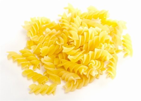 dried italian pasta (macaroni) isolated on white background Fotografie stock - Microstock e Abbonamento, Codice: 400-05359096