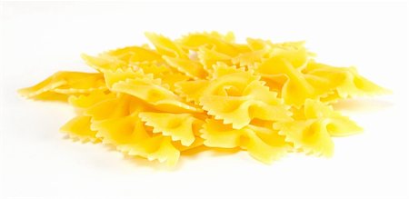 dried italian pasta (macaroni) isolated on white background Foto de stock - Super Valor sin royalties y Suscripción, Código: 400-05359098