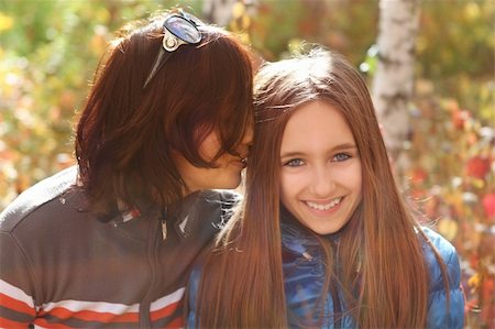 Mother and daughter teen in autumn park Stock Photo - Budget Royalty-Free & Subscription, Code: 400-05359455