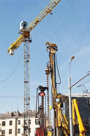 simsearch:400-06075932,k - Construction site with crane and other machines Fotografie stock - Microstock e Abbonamento, Codice: 400-05359501