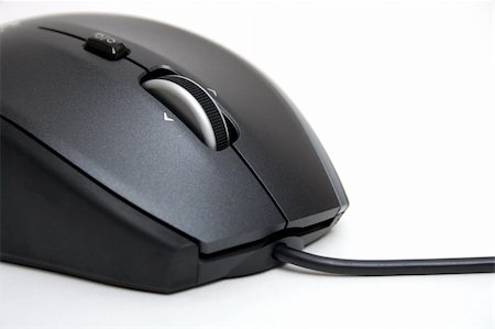Dark computer mouse isolated on white background Photographie de stock - Aubaine LD & Abonnement, Code: 400-05350042