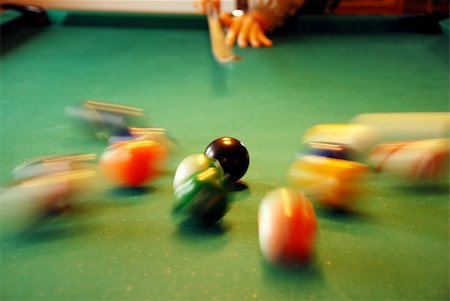 cue shooting at billiards balls movement indoor Stock Photo - Budget Royalty-Free & Subscription, Code: 400-05350294