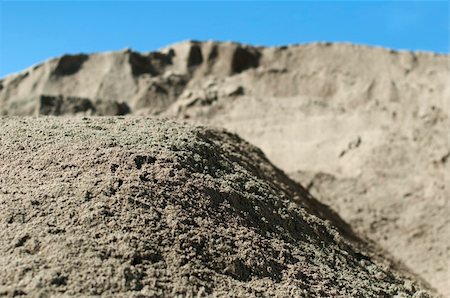 stone quarry - Piles of sand. Close up and far. Horizontal image Foto de stock - Super Valor sin royalties y Suscripción, Código: 400-05350308