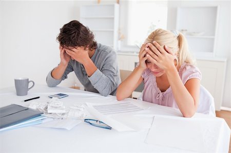 simsearch:400-09030070,k - Worried couple doing accountsin their living room Stock Photo - Budget Royalty-Free & Subscription, Code: 400-05350381