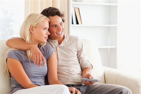 elegant tv room - Cute couple watching TV in their living room Stock Photo - Budget Royalty-Free & Subscription, Code: 400-05350510