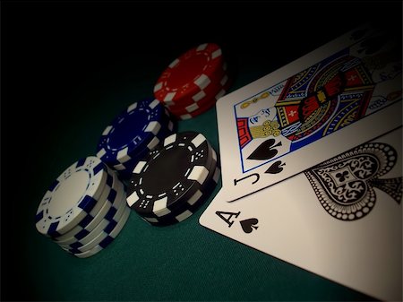 simsearch:700-06302301,k - Red, blue, white, black poker chips on a green felt gaming table. Two cards and chips are spotlighted.  Jack of Spades and Ace of Spades gives a Blackjack winner. Stock Photo - Budget Royalty-Free & Subscription, Code: 400-05350526