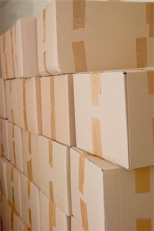 simsearch:400-04354403,k - Cardboard boxes piled up to the roof Photographie de stock - Aubaine LD & Abonnement, Code: 400-05350905