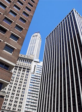 Modern office buildings in New York over blue sky Stock Photo - Budget Royalty-Free & Subscription, Code: 400-05351013