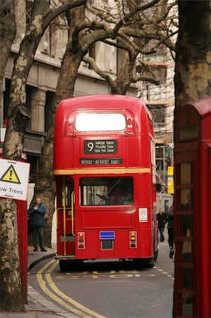 Route Master Bus in the street of London. Route Master Bus is the most iconic symbol of London as well as London's Black cabs. Stockbilder - Microstock & Abonnement, Bildnummer: 400-05351267