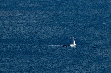 simsearch:400-08806132,k - Sailboat on open sea, blue waters Stock Photo - Budget Royalty-Free & Subscription, Code: 400-05351539