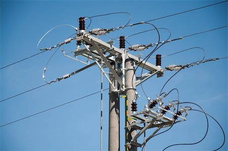 electricity pole - electric pole and high-voltage lines with insulators Stock Photo - Budget Royalty-Free & Subscription, Code: 400-05351733