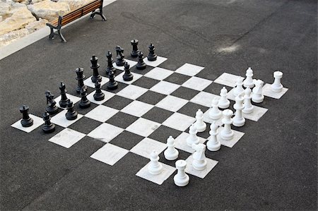 Outdoor chess game and big chess board Stock Photo - Budget Royalty-Free & Subscription, Code: 400-05351909