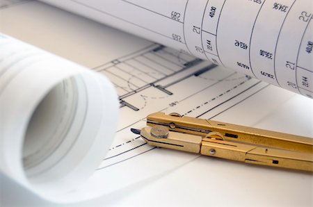 simsearch:400-05243756,k - Detail of a compass and rolls of blueprints Photographie de stock - Aubaine LD & Abonnement, Code: 400-05351970