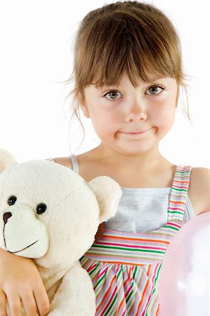 small little girl pic to hug a teddy - Portrait of a sweet little girl cuddling a teddy bear, isolated on white Stock Photo - Budget Royalty-Free & Subscription, Code: 400-05352229
