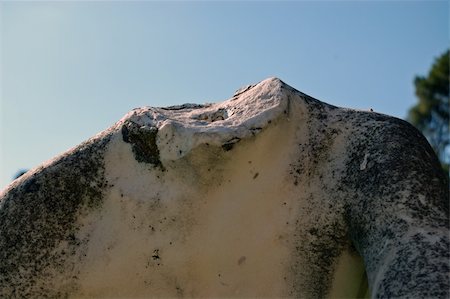 Detail of a vandalized headless marble statue sculpture. Stock Photo - Budget Royalty-Free & Subscription, Code: 400-05352457