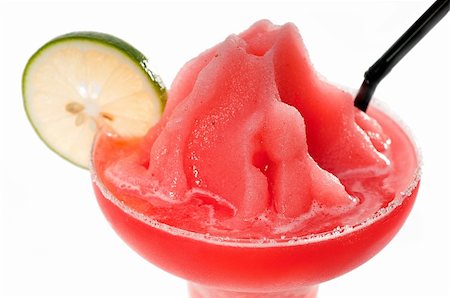 daiquiri glass - frozen strawberry  margarita daiquiri with lime and black straw isolated on white background Stock Photo - Budget Royalty-Free & Subscription, Code: 400-05352929