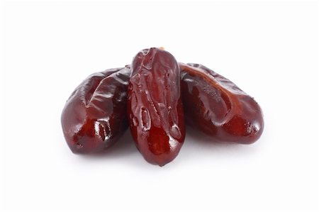 Three dates isolated on white background Fotografie stock - Microstock e Abbonamento, Codice: 400-05353227