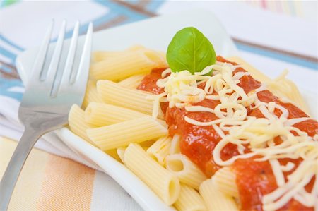 rigatoni parmesan - italian food pasta with tomato cheese and basil Stock Photo - Budget Royalty-Free & Subscription, Code: 400-05353240