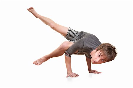 simsearch:400-04328141,k - Young man in Koundinyasana posture over white background Stock Photo - Budget Royalty-Free & Subscription, Code: 400-05353785
